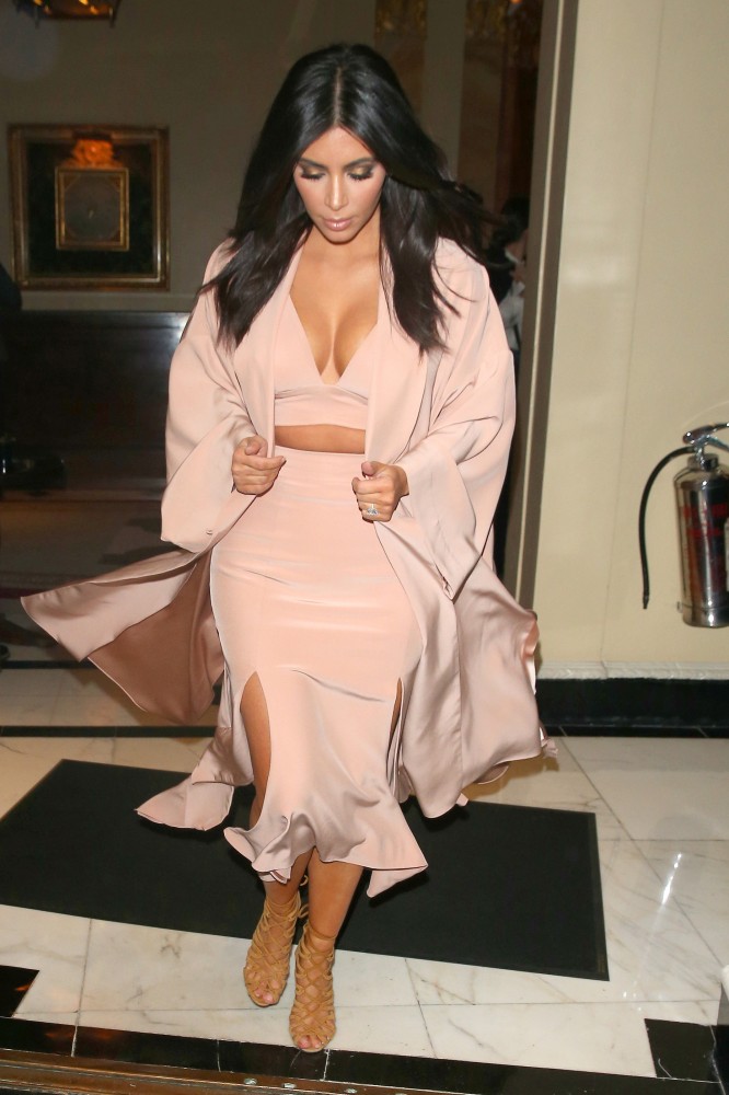 87-Kim-Kardashians-Hairfinity-Launch-Party-Juan-Carlos-Obando-Spring-2015-Peach-Crop-Top-Double-Slit-Skirt-and-Jacket-Khloe-Kardashian-Black-Alexander-McQueen-Buttoned-Dress-666x1000