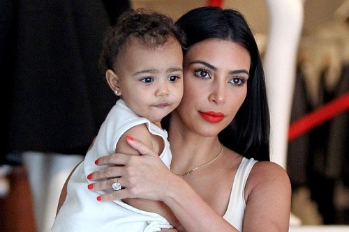 Kim-Kardashian-Gives-North-West-Present-Angers-Fans--650x433