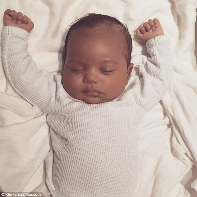 3173012400000578-3458463-The_first_picture_Saint_West_is_seen_sleeping_in_an_image_releas-a-14_1456151554472